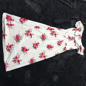 White dress with pink flowers.